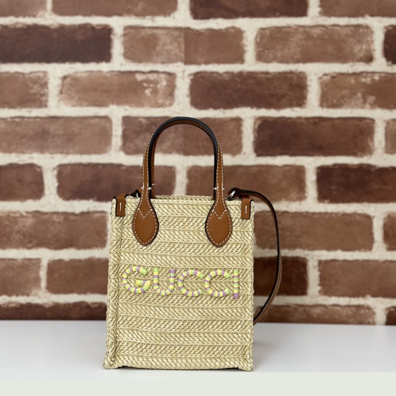 G*u*i top handle bags